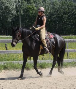 Birgit riding one of the training horses