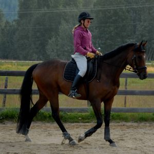 Birgit riding a training horse